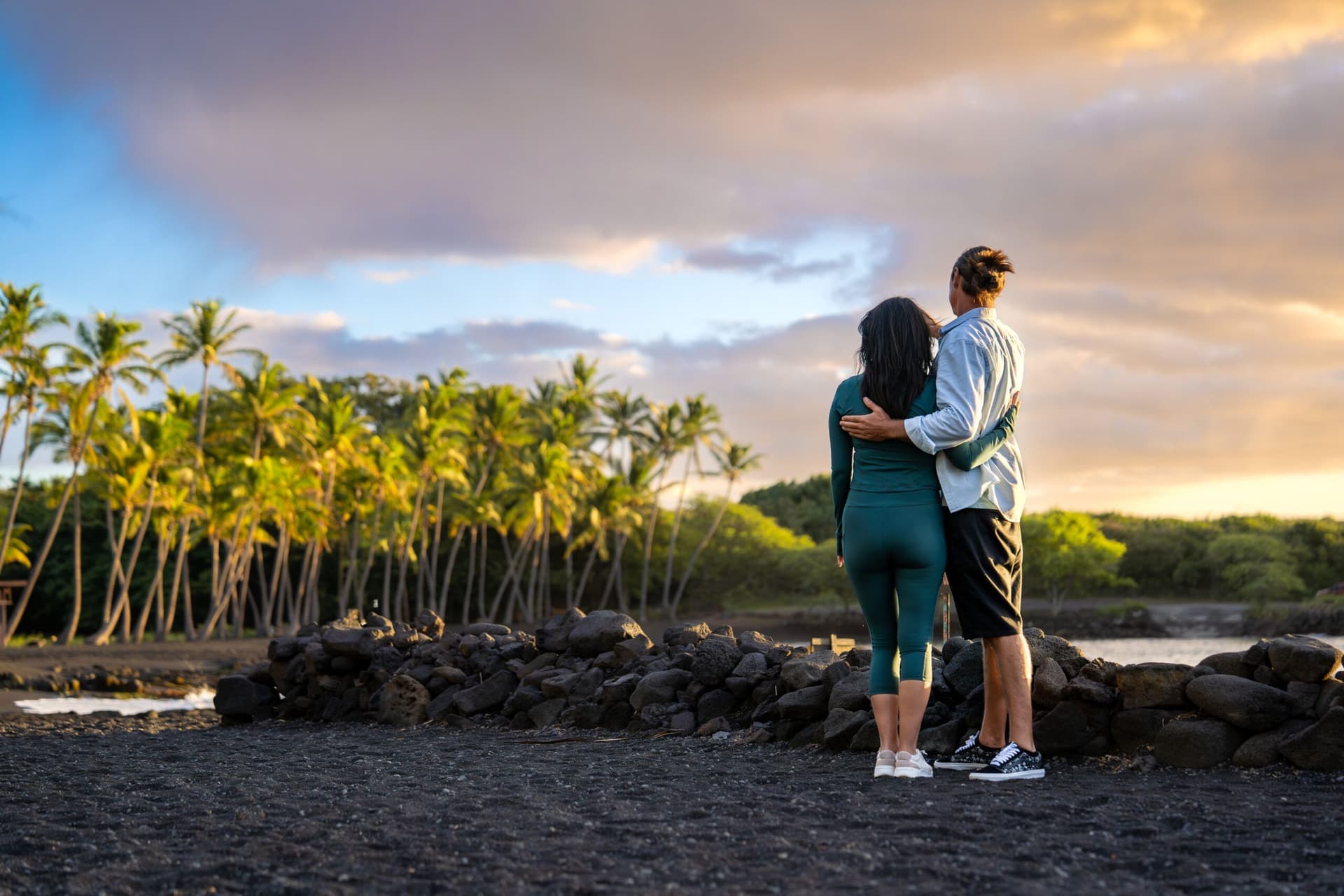 A couple looking out at the ocean in Hawaii