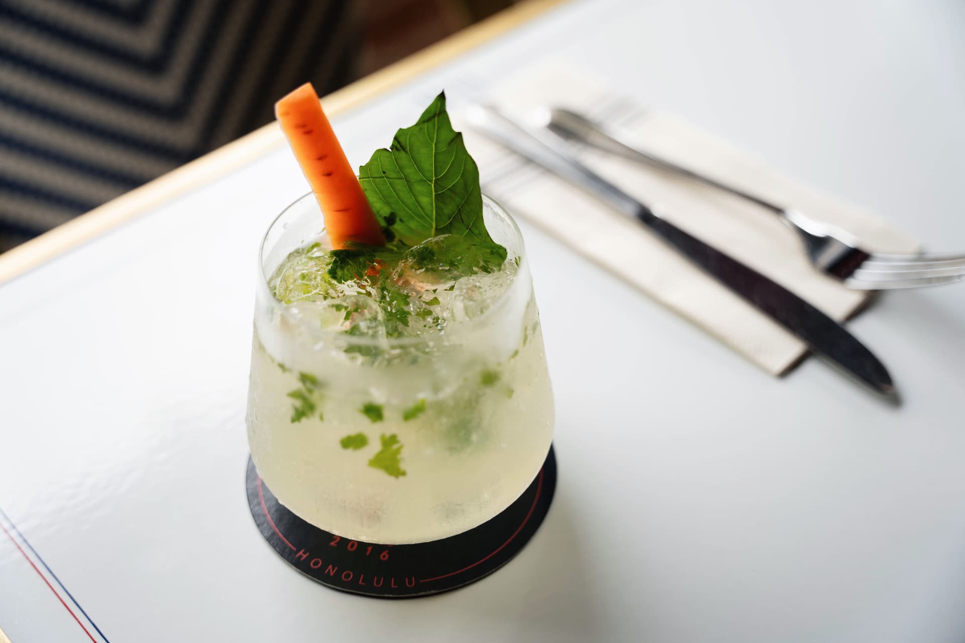 Cocktail with herbs and carrot