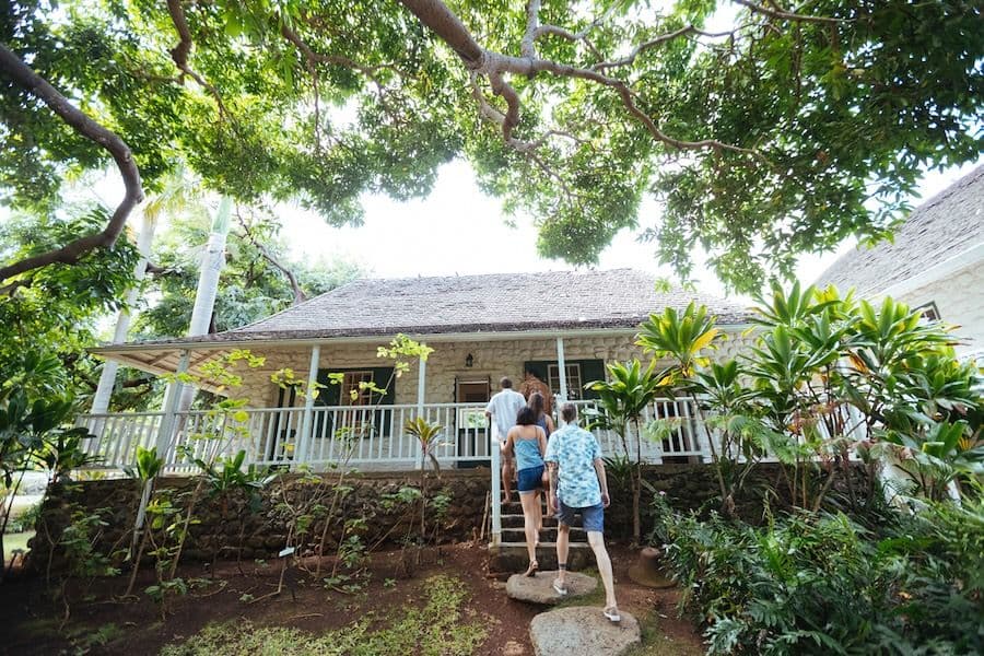 People walking into a historic museum on maui hawaii.