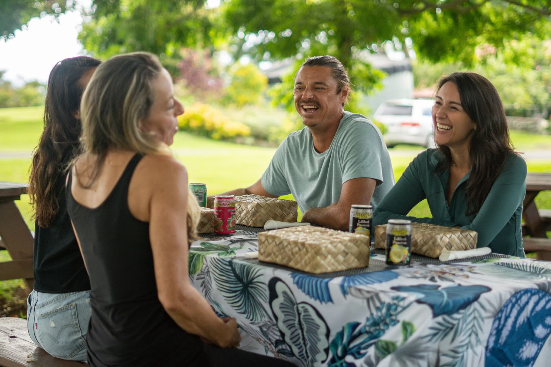 Friends having a picnic in the park.
