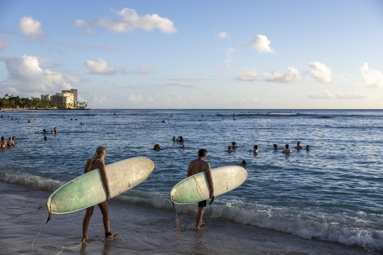 Surfing Oʻahu. Photo by Marco Garcia.