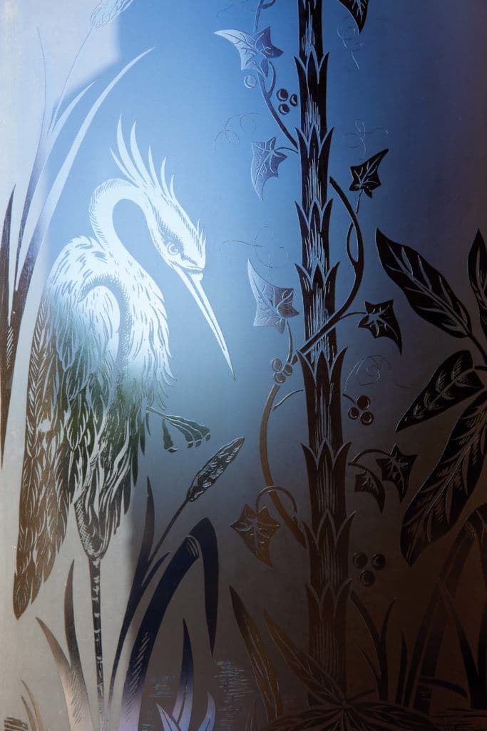 An original glass piece ordered in England, etched in San Francisco, and installed in time for King Kalakaua’s grand opening of the palace in 1882.