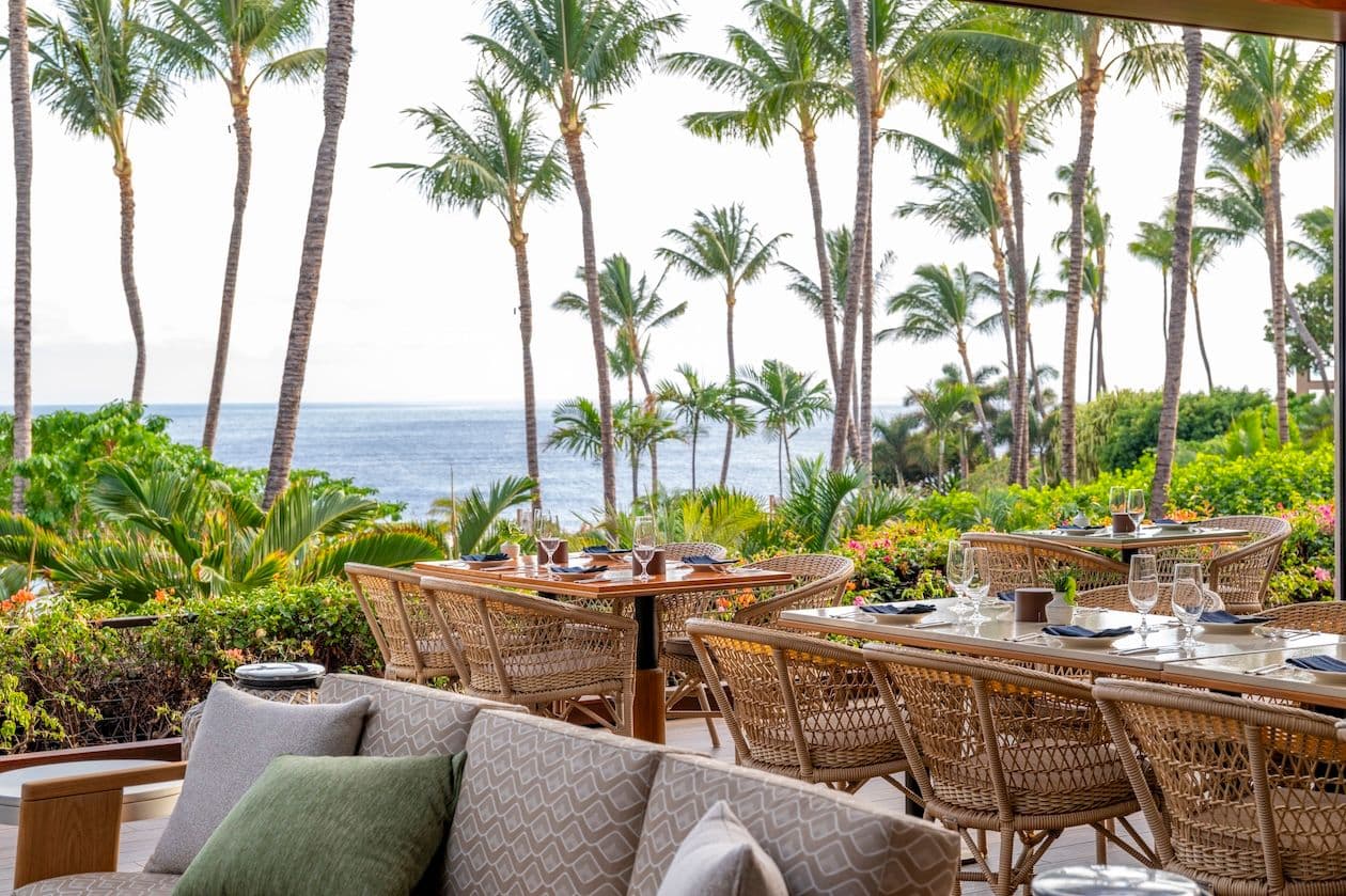 Osteria Mozza Lānaʻi features an open-air dining room with lanaʻi seating overlooking the ocean. Courtesy of Four Seasons Resort Lānaʻi.