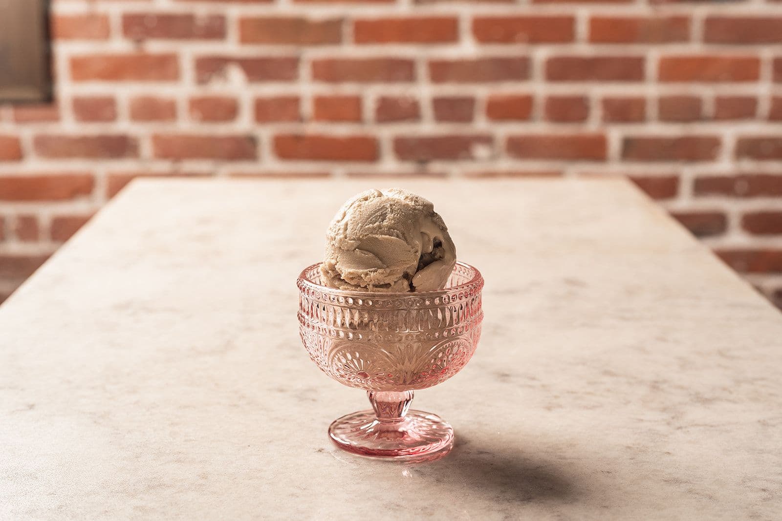 Ice cream in a pink glass
