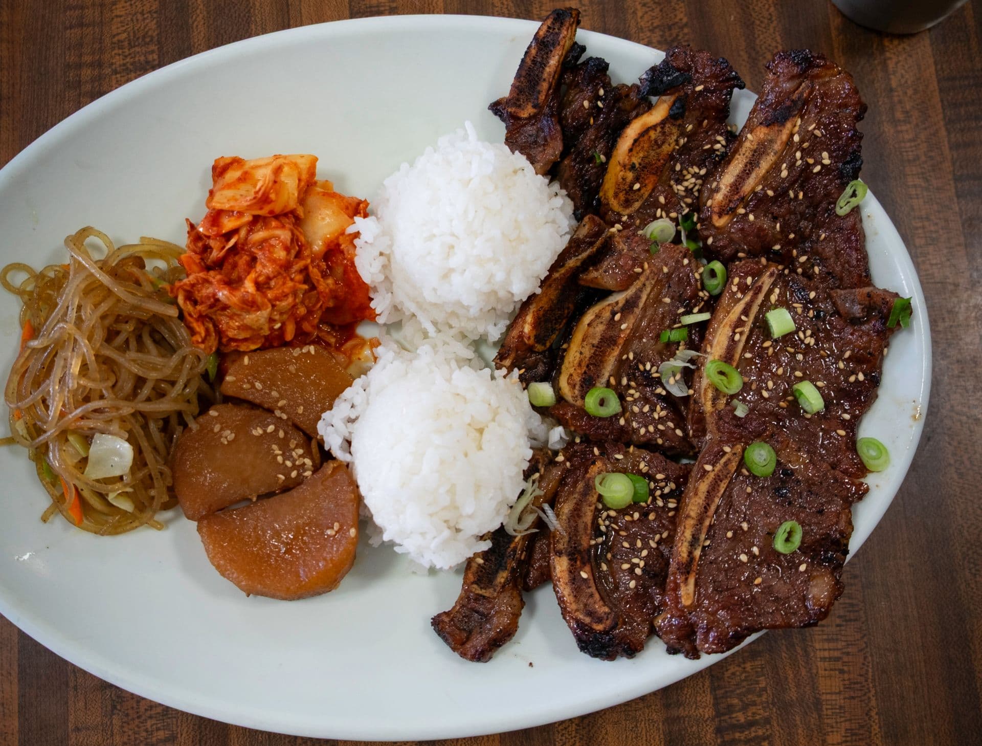 plate lunch with kalbi ribs, white rice and banchan