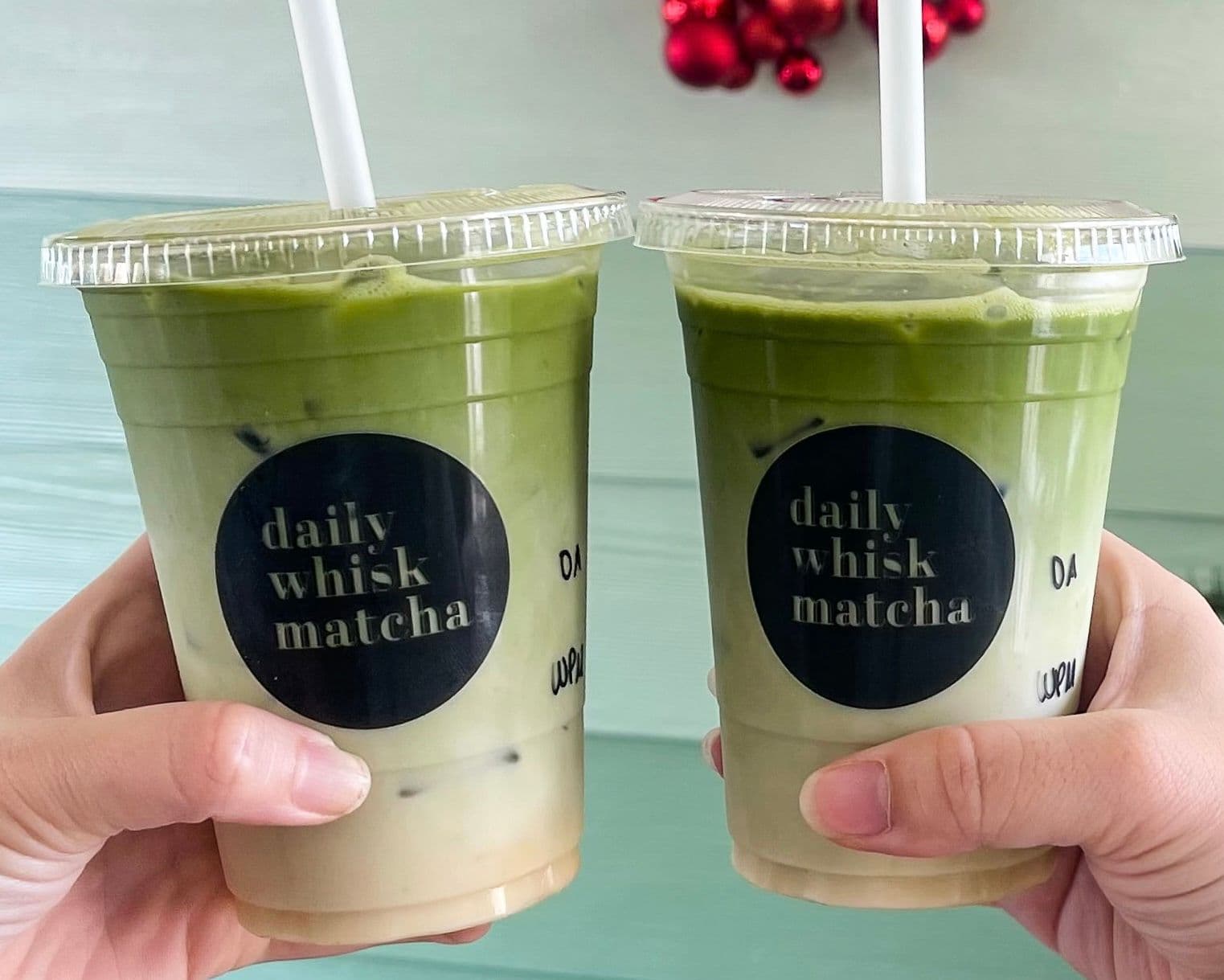 Two iced matcha lattes
