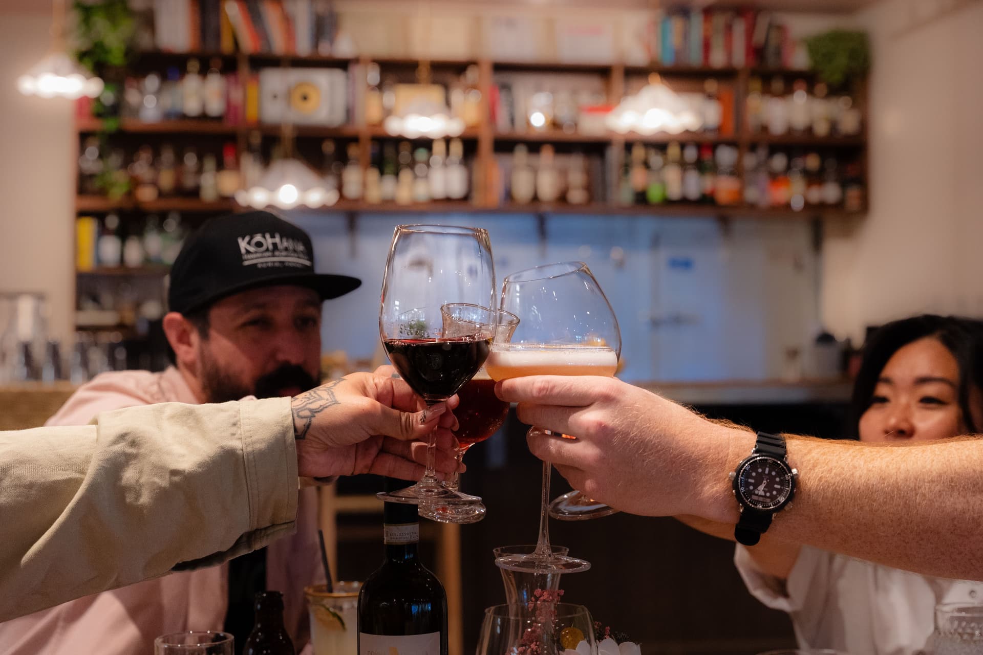 People clinking cocktails