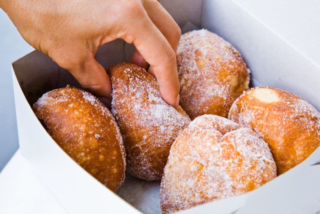 Malasadas. Courtesy of Hawaiʻi Tourism Authority. Photo by Tor Johnson.