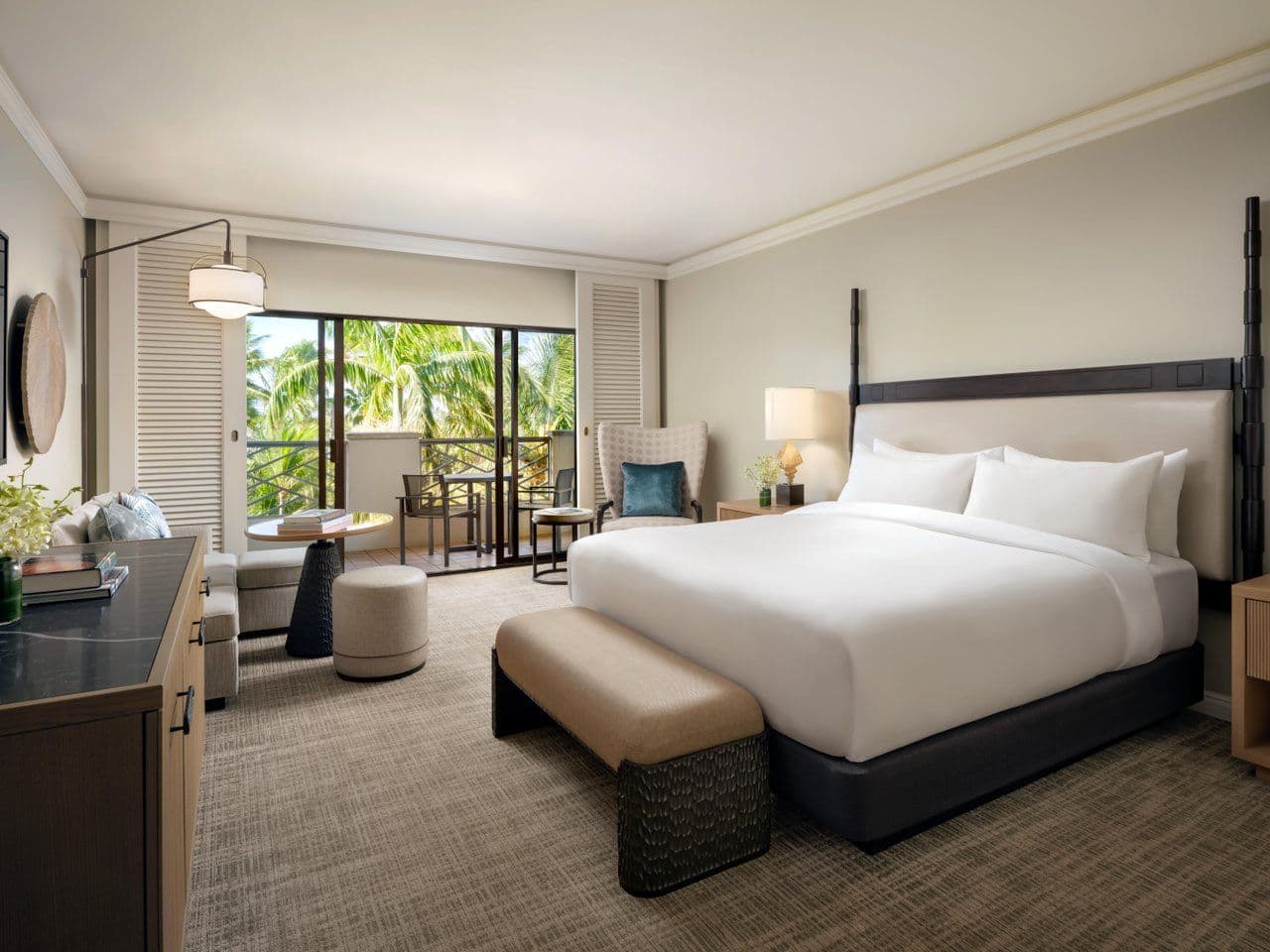 Hotel room with king sized bed and patio