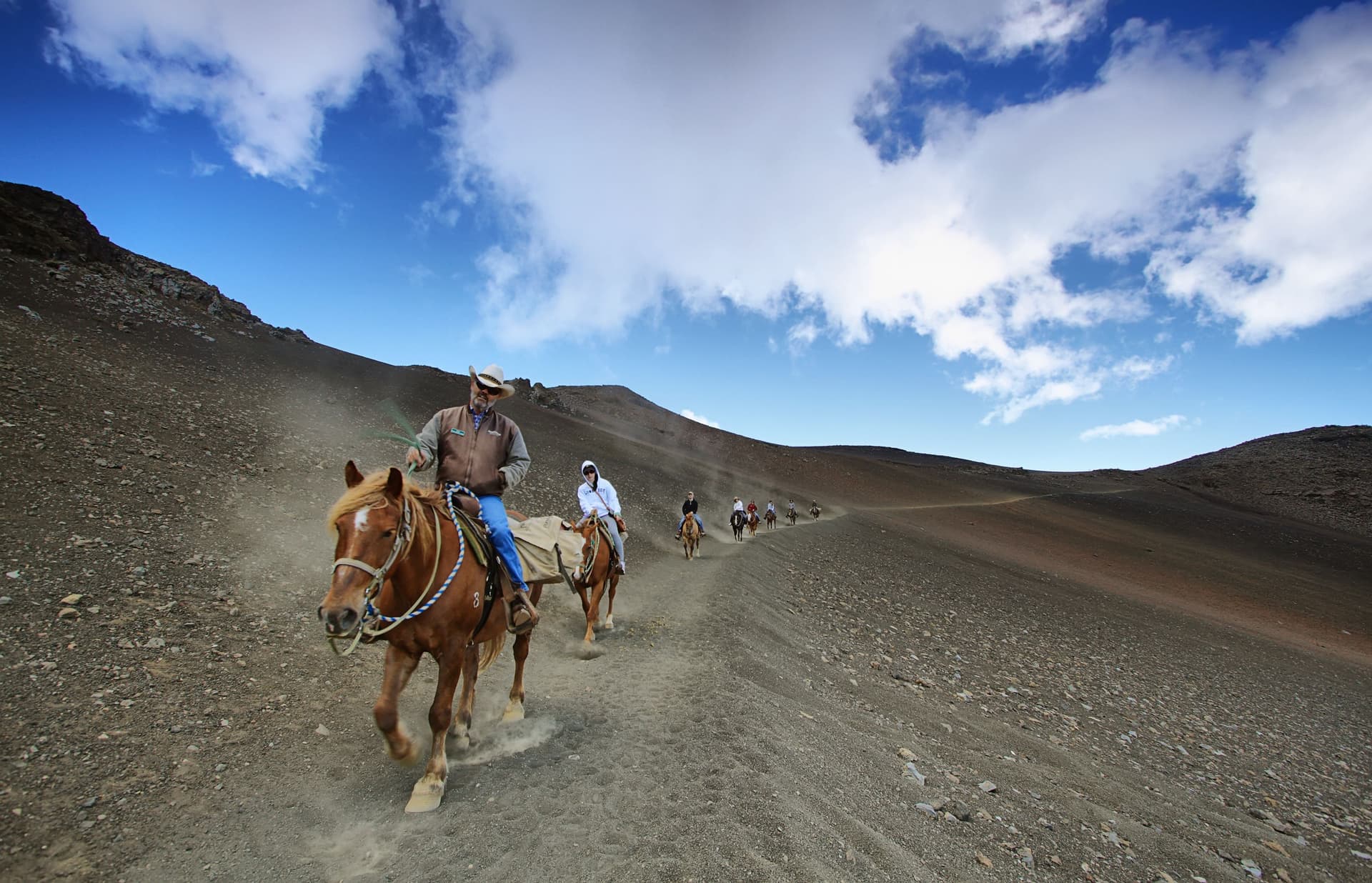 Sliding sands trail, Haleakala national park, Maui People horseback riding.