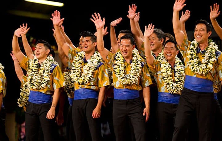 The kane from Na Kamalei (Kumu Hula Robert Uluwehi Cazimero; Honolulu, Oahu) dance during the AUANA portion of the Merrie Monarch Festival competition. PHOTO BY DENNIS ODA. APRIL 10, 2015.