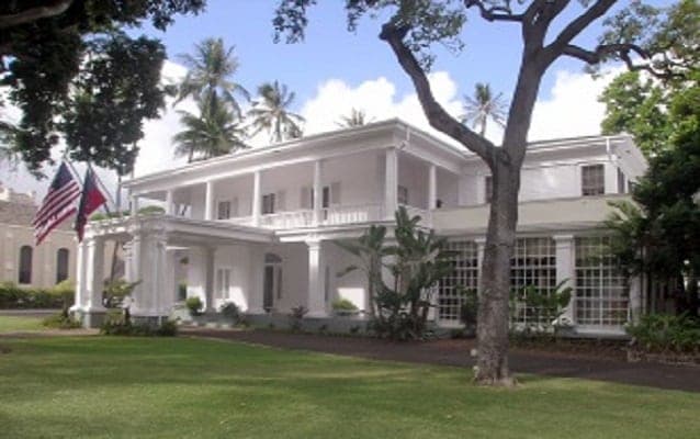 two story white building