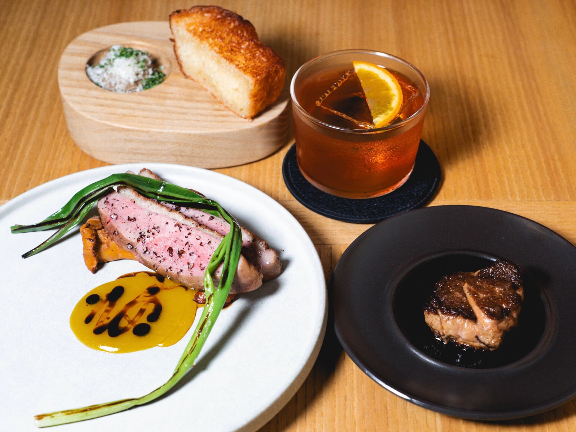 Hay-aged duck breast with foie gras at Bar Māze. Photo by Corina Quach.