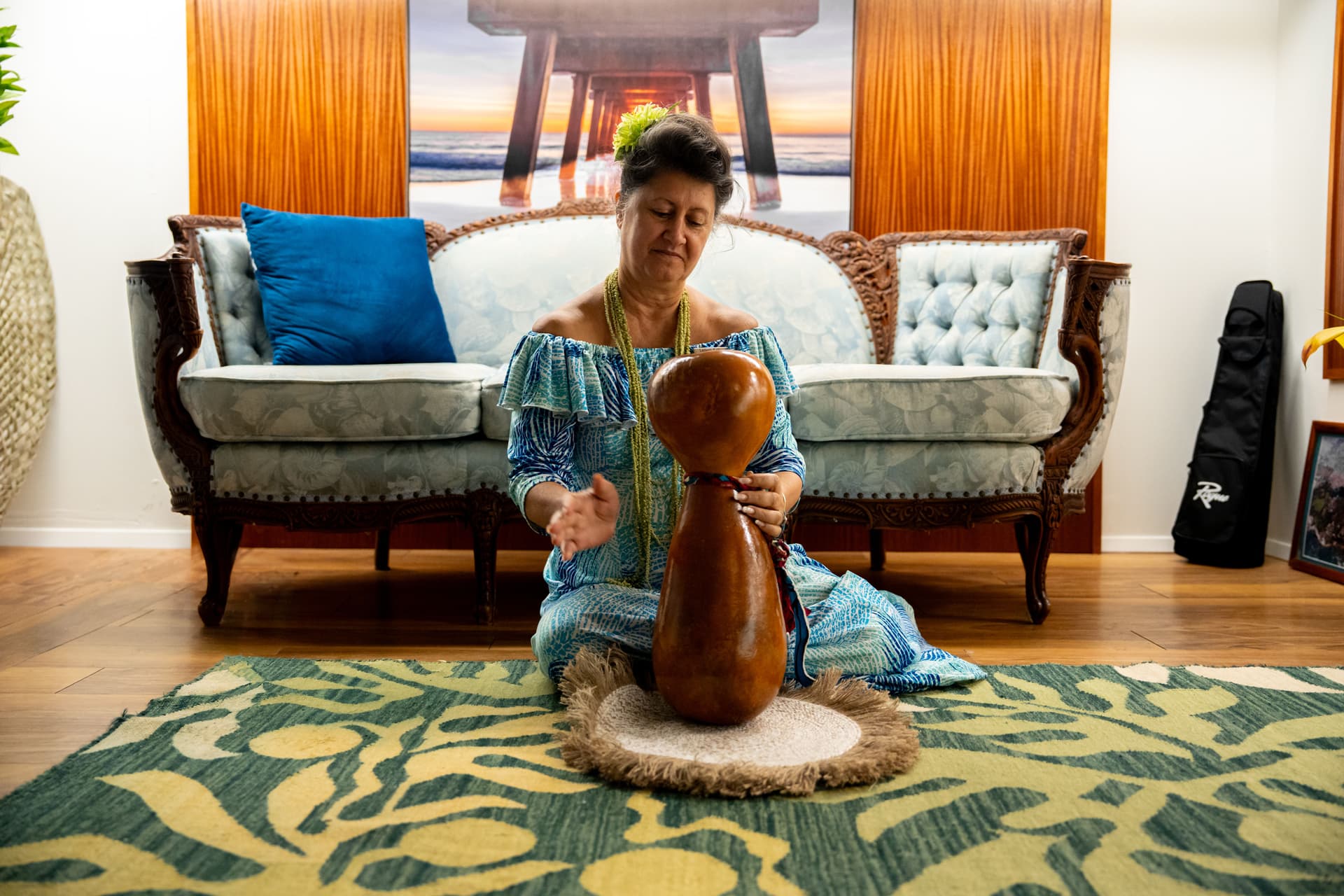 Woman playing ipu in a cultural center on Oahu