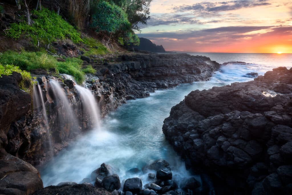 Waterfall near Queen's Bath at sunset, Kauai, Hawaiihateii hawiia hawaii. hawaiii hawiaii hwaii hawaai hawall hawii hawwai hawwaii hawwii hiwaii haiwaii hawia hawwi 1112750291
