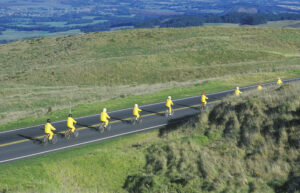 Gorup of bicycle rides descend Haleakala